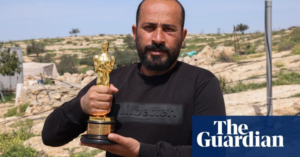 ‘I thought I was going to die’: director Hamdan Ballal recounts attack by settlers and soldiers in West Bank | West Bank