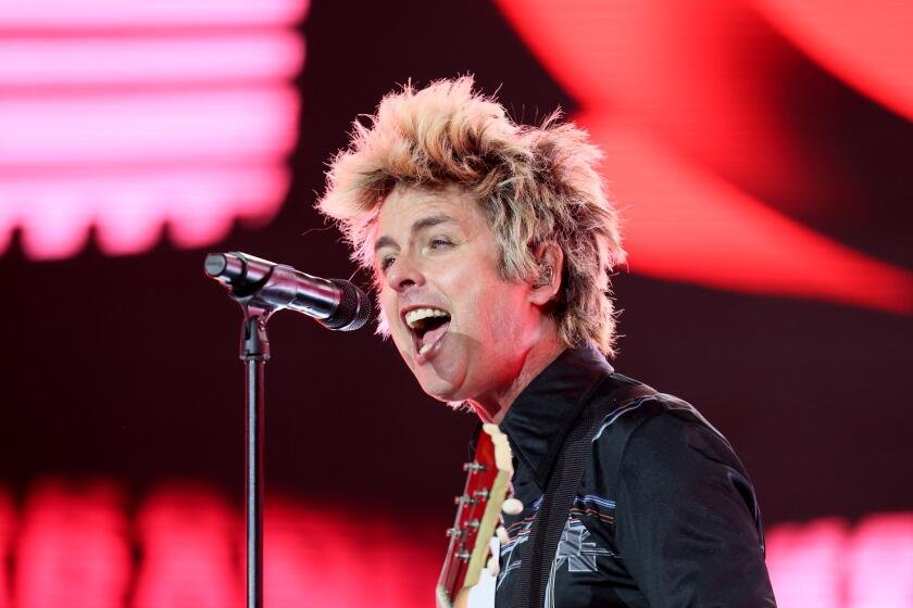 Green Day whips through its decades of pop-punk hits at Coachella Green Day whips through its decades of pop-punk hits at Coachella